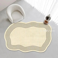 Irregular Cream Oval Area Rug